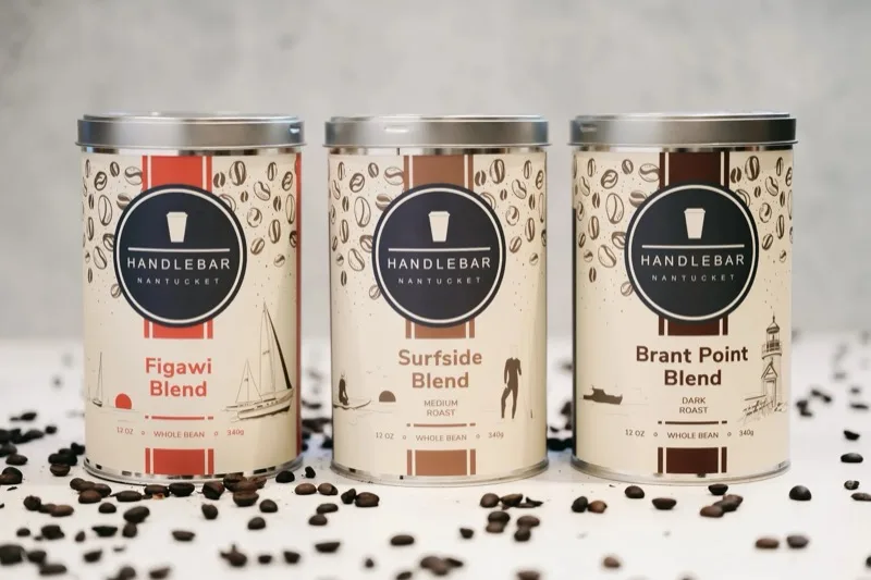 Handlebar Nantucket branded whole-bean coffee tins — Figawi, Surfside, and Brant Point blends